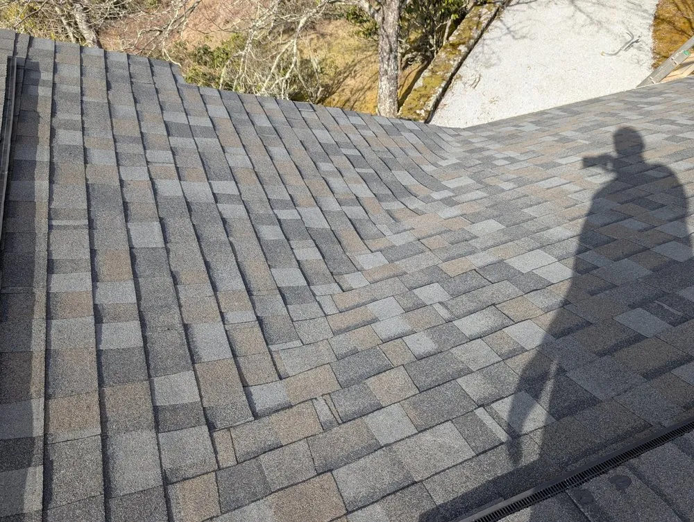 Slide of Four Families Roofing