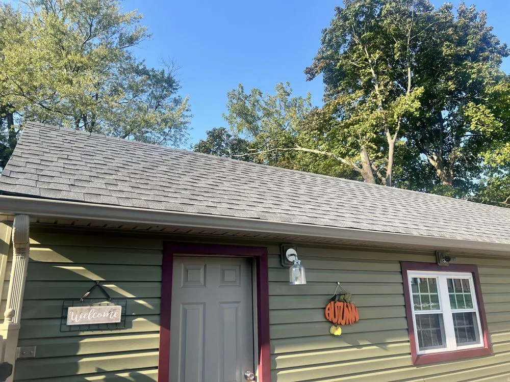 Slide of Four J's Contracting & Roofing