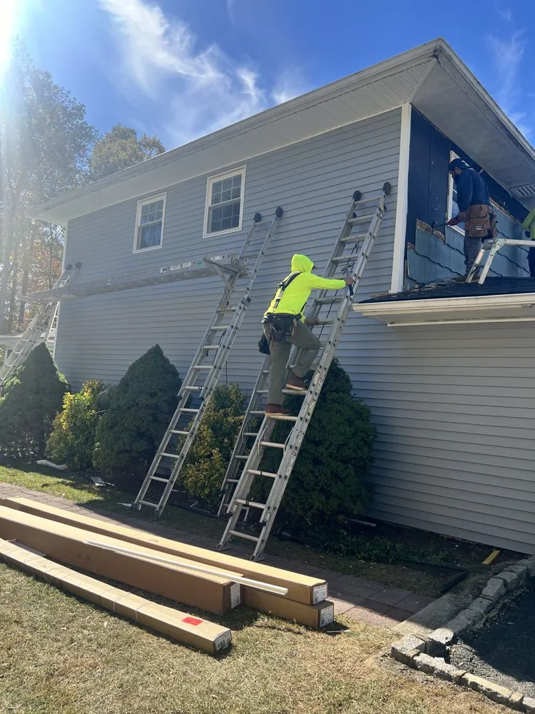 Slide of Four J's Contracting & Roofing
