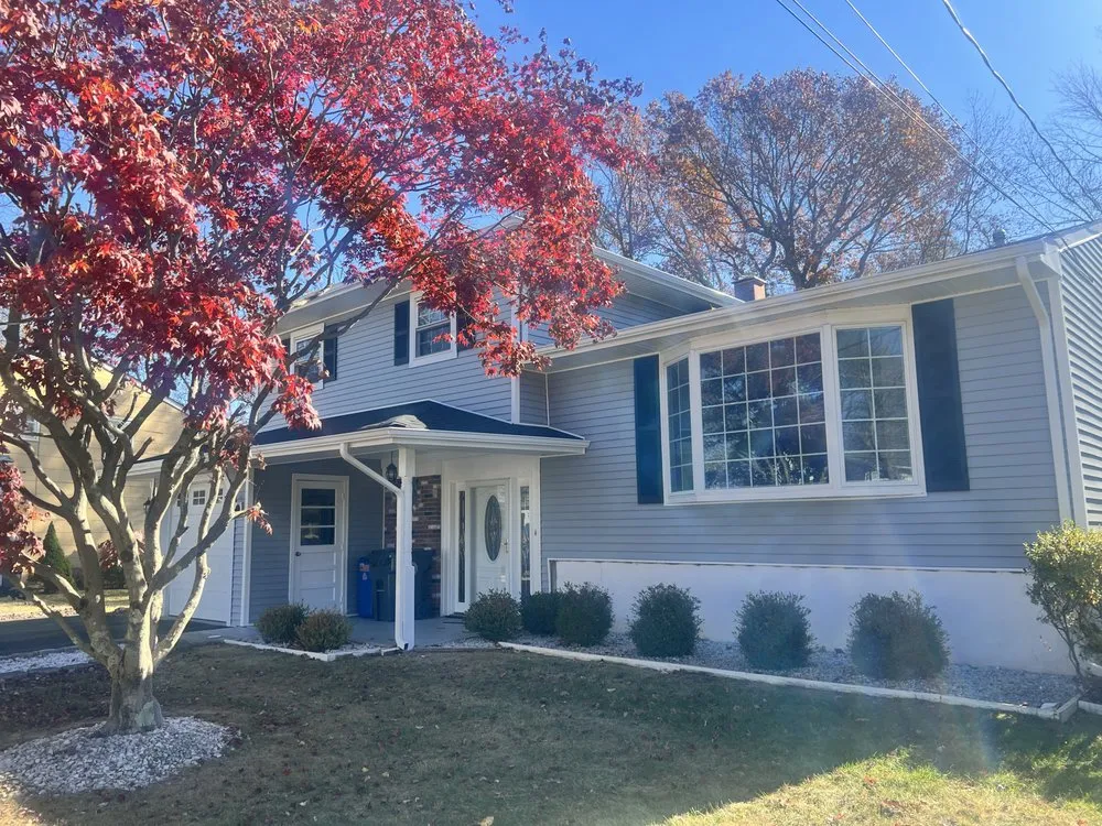 Slide of Four J's Contracting & Roofing