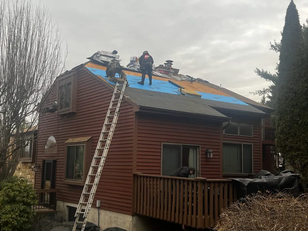 Slide of Four J's Contracting & Roofing