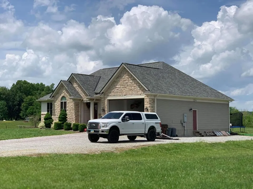 Slide of Four Paws Roofing & Remediation