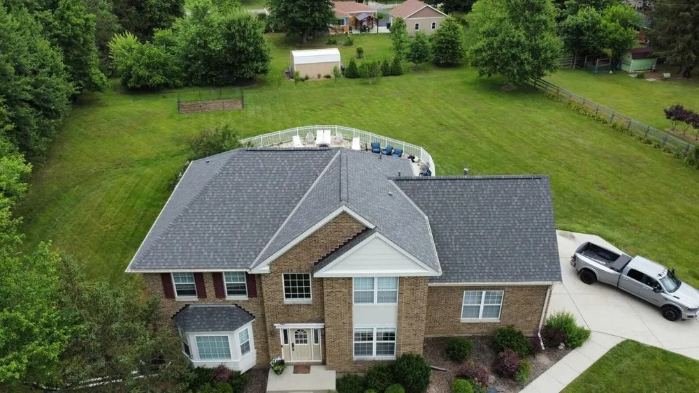 Slide of Four Paws Roofing & Remediation