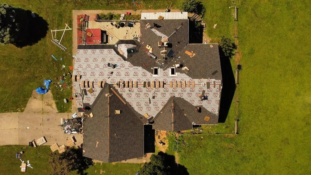 Slide of Four Paws Roofing & Remediation