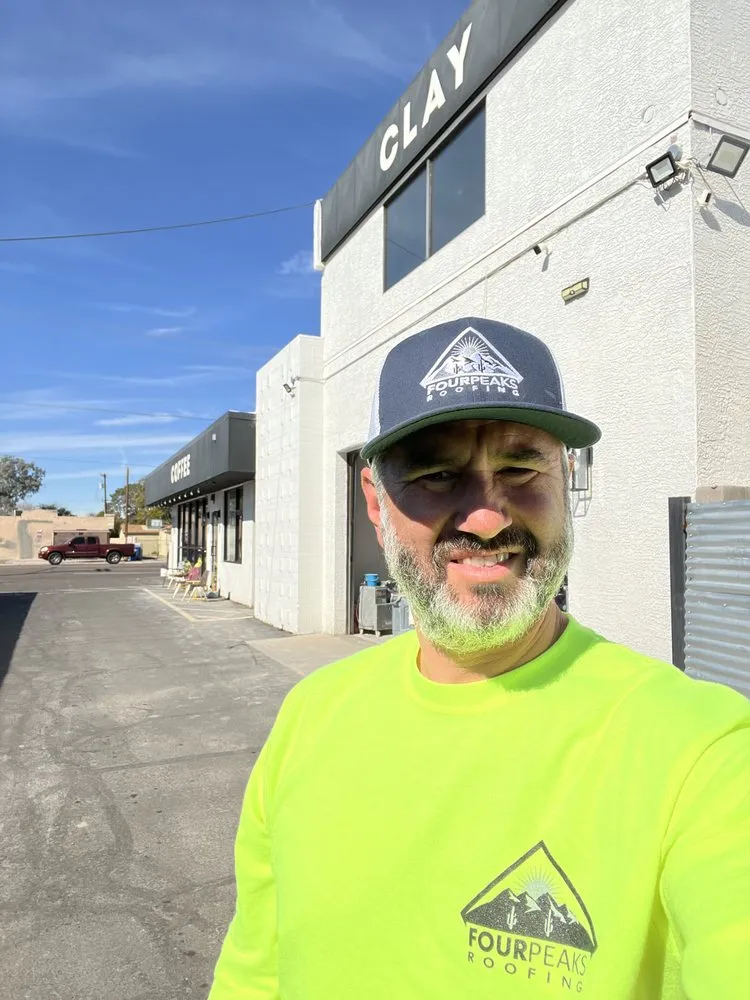 Slide of Four Peaks Roofing