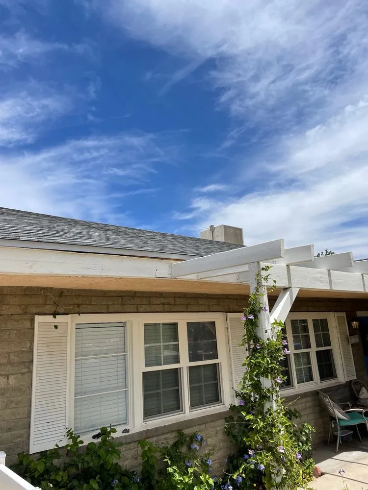 Slide of Four Peaks Roofing