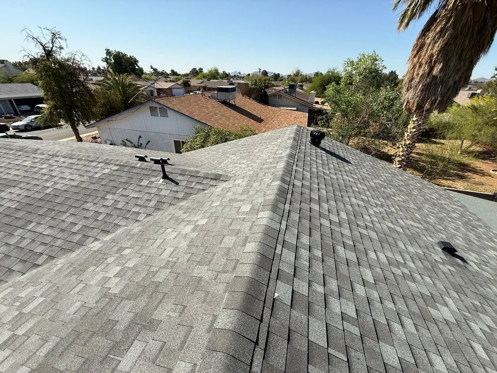 Slide of Four Peaks Roofing