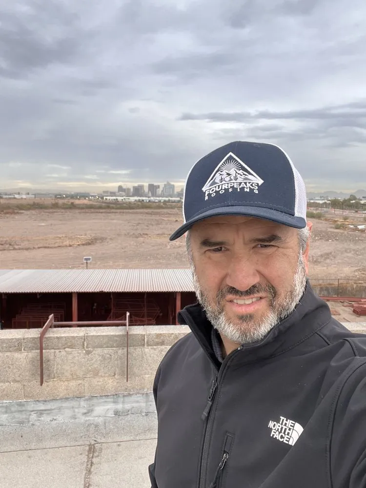 Slide of Four Peaks Roofing