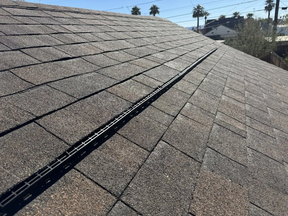 Slide of Four Peaks Roofing