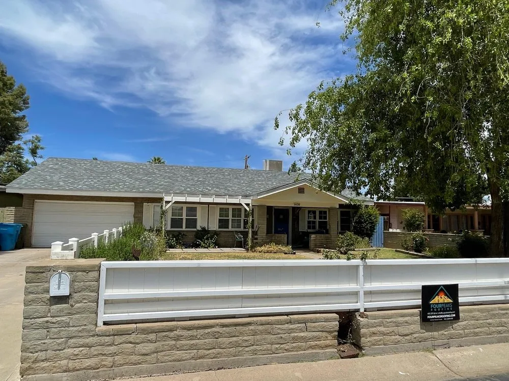 Slide of Four Peaks Roofing