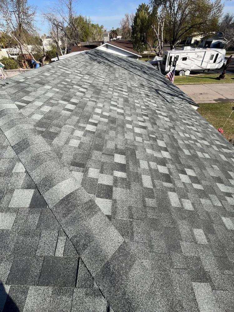 Slide of Four Peaks Roofing