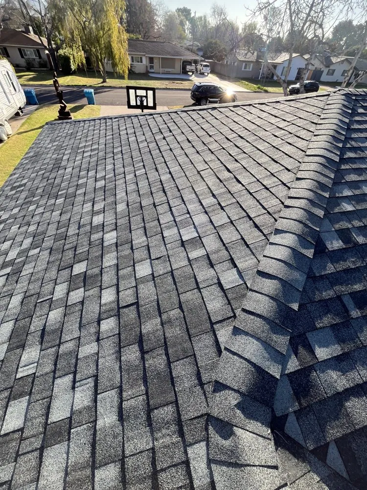 Slide of Four Peaks Roofing