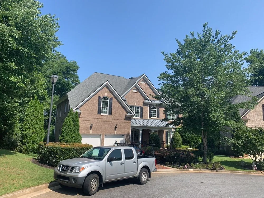 Slide of Four Seasons Roofing & Repair