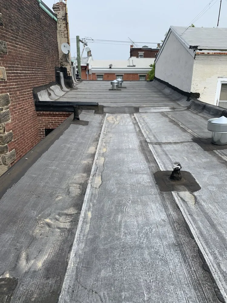 Slide of Four Seasons Roofing & Siding