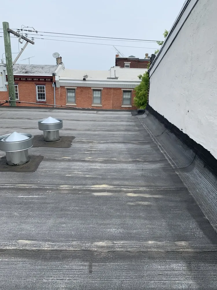 Slide of Four Seasons Roofing & Siding