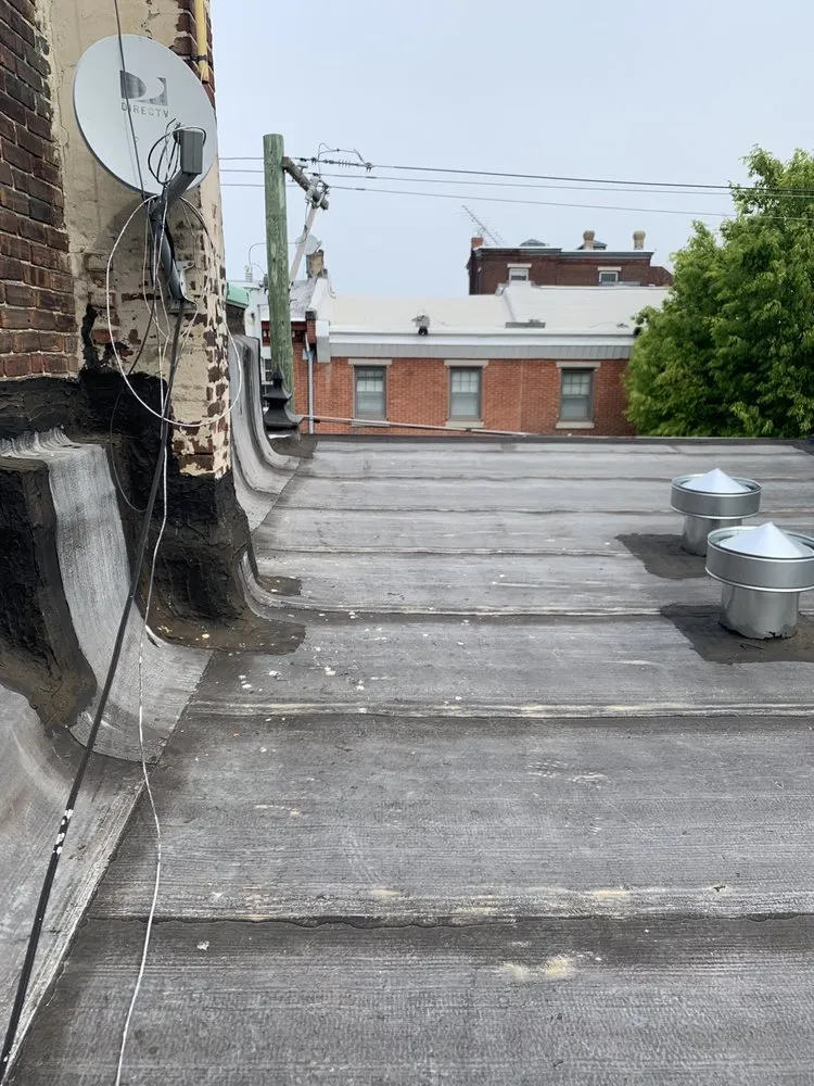 Slide of Four Seasons Roofing & Siding