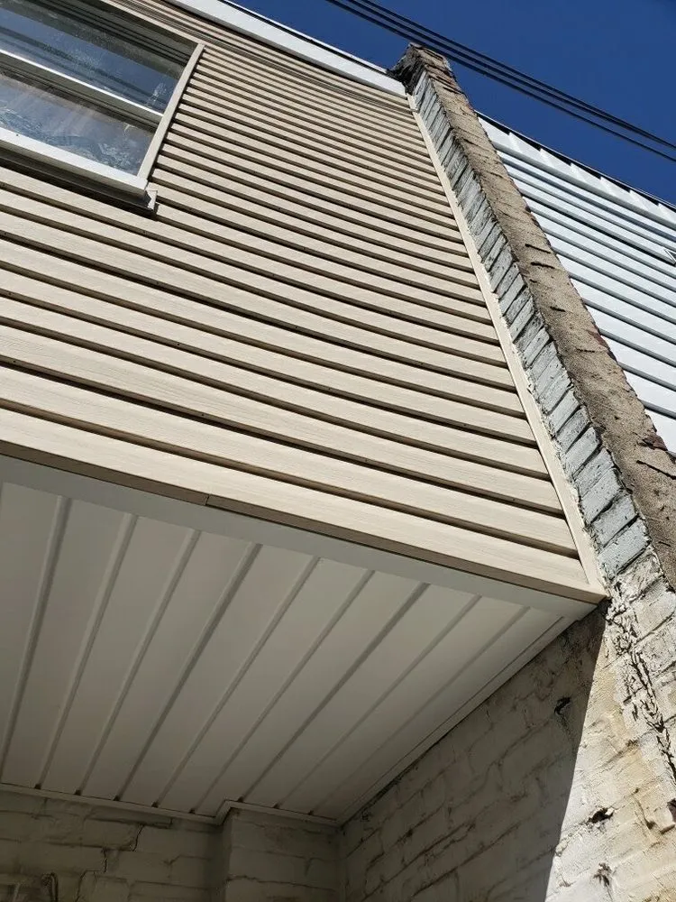 Slide of Four Seasons Roofing & Siding