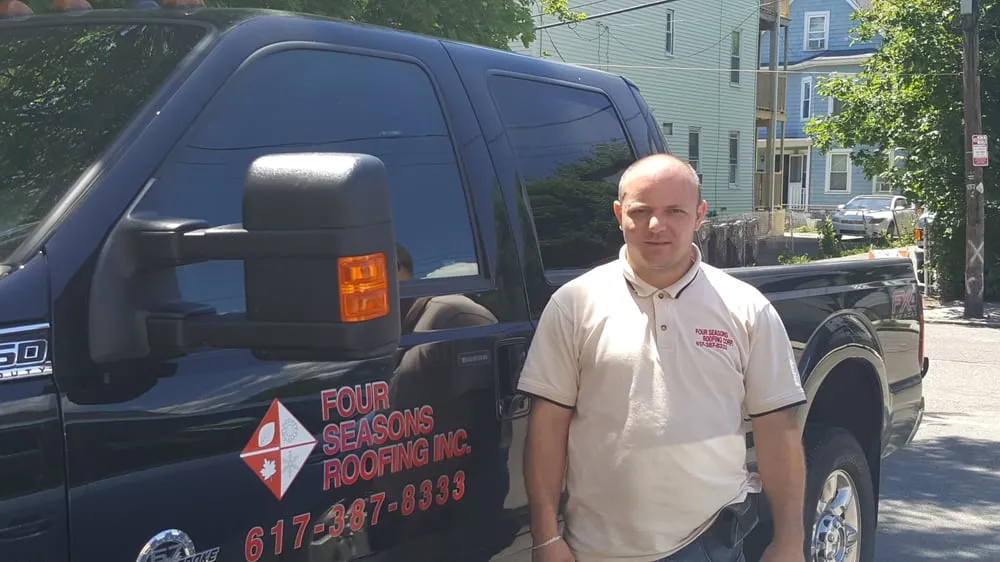 Slide of Four Season's Roofing