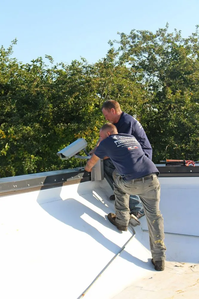 Slide of Four Seasons Roofing