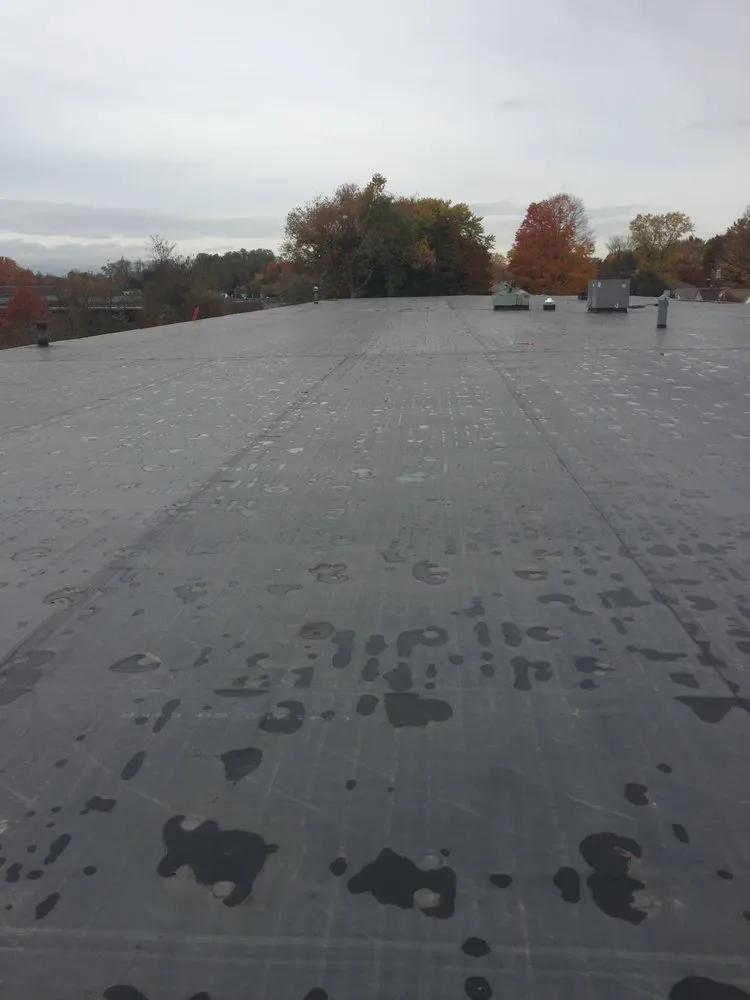 Slide of Four Seasons Roofing