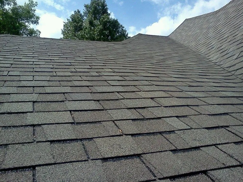 Slide of Four Square Roof Cleaning