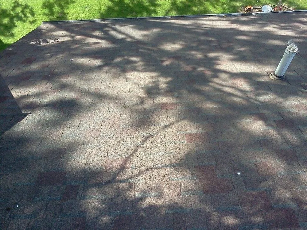 Slide of Four Square Roof Cleaning