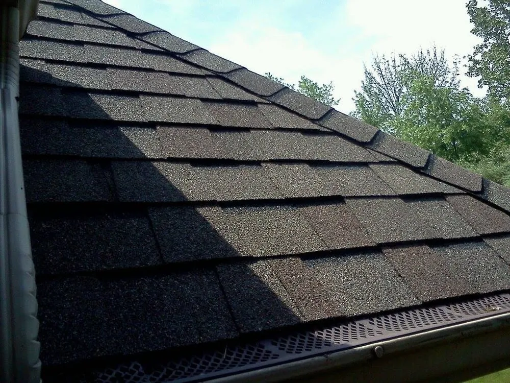 Slide of Four Square Roof Cleaning