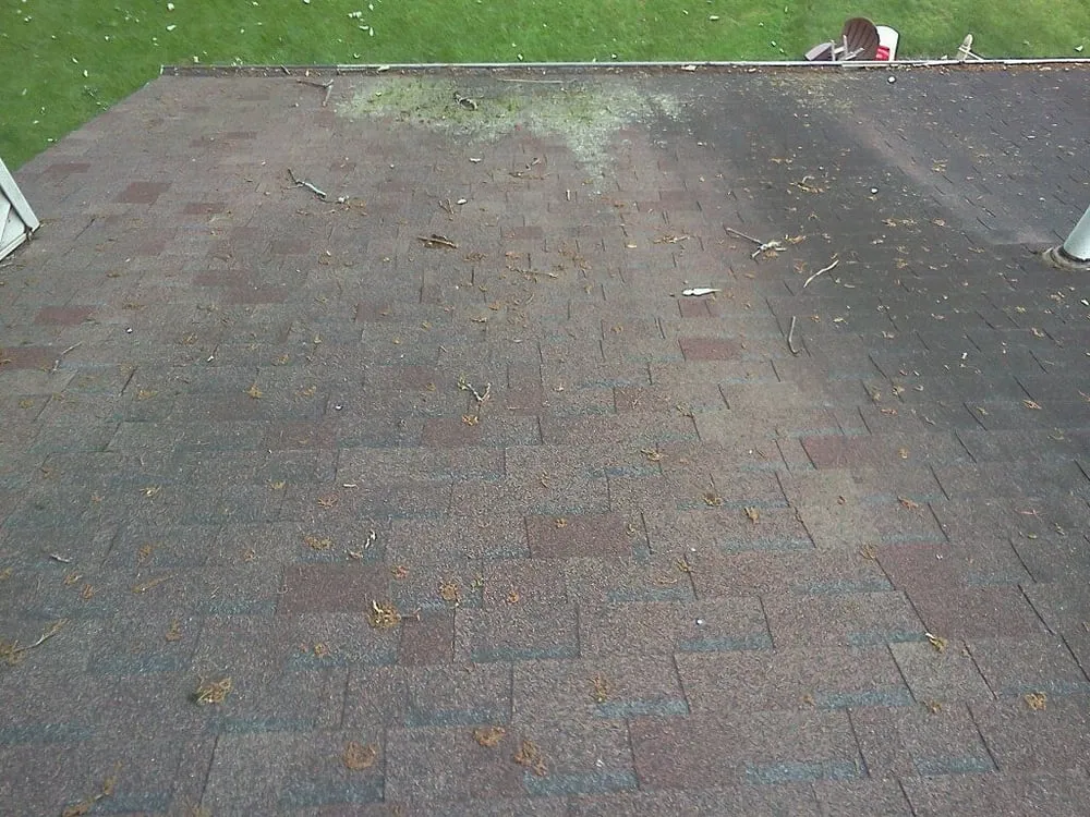 Slide of Four Square Roof Cleaning