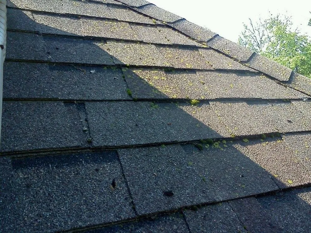 Slide of Four Square Roof Cleaning