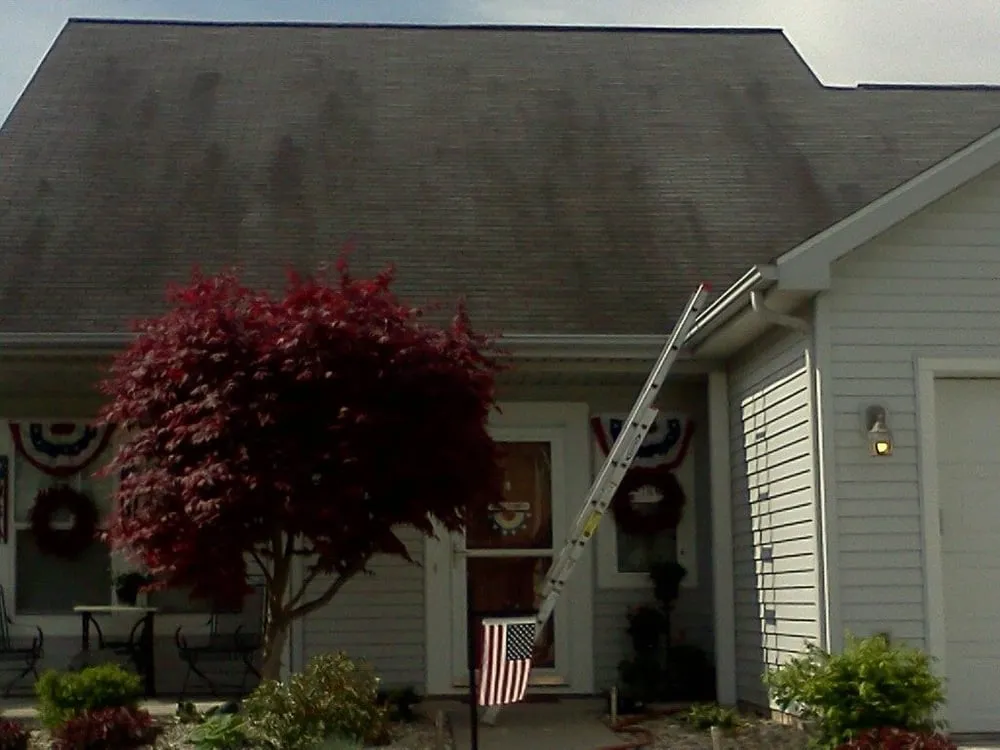 Slide of Four Square Roof Cleaning