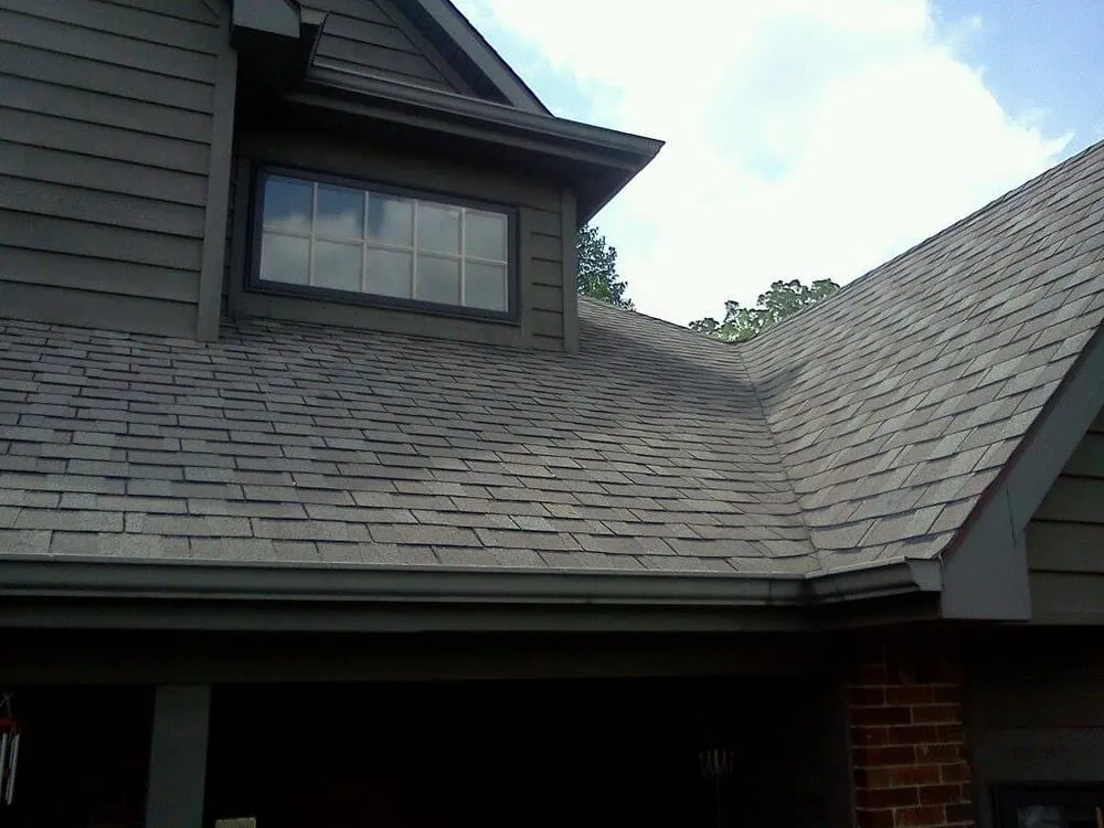 Slide of Four Square Roof Cleaning