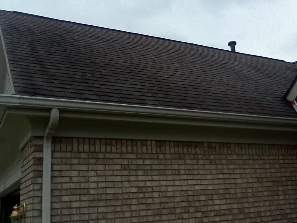 Slide of Four Square Roof Cleaning