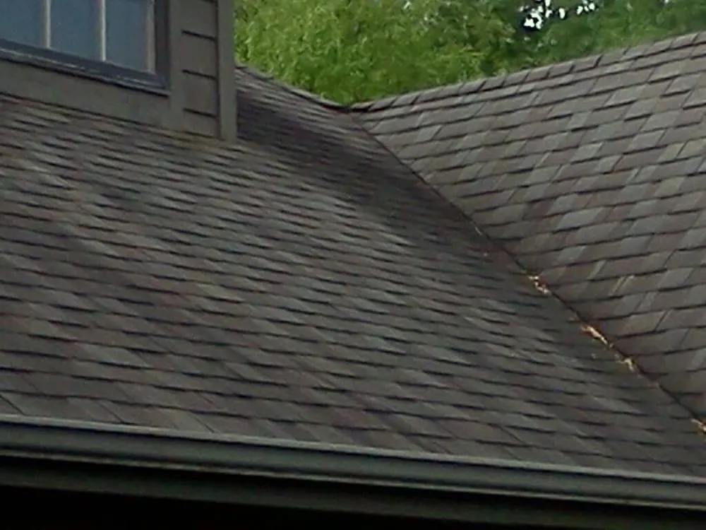 Slide of Four Square Roof Cleaning