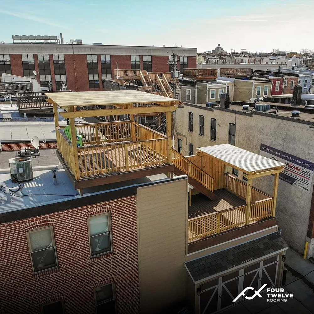 Slide of Four Twelve Roofing