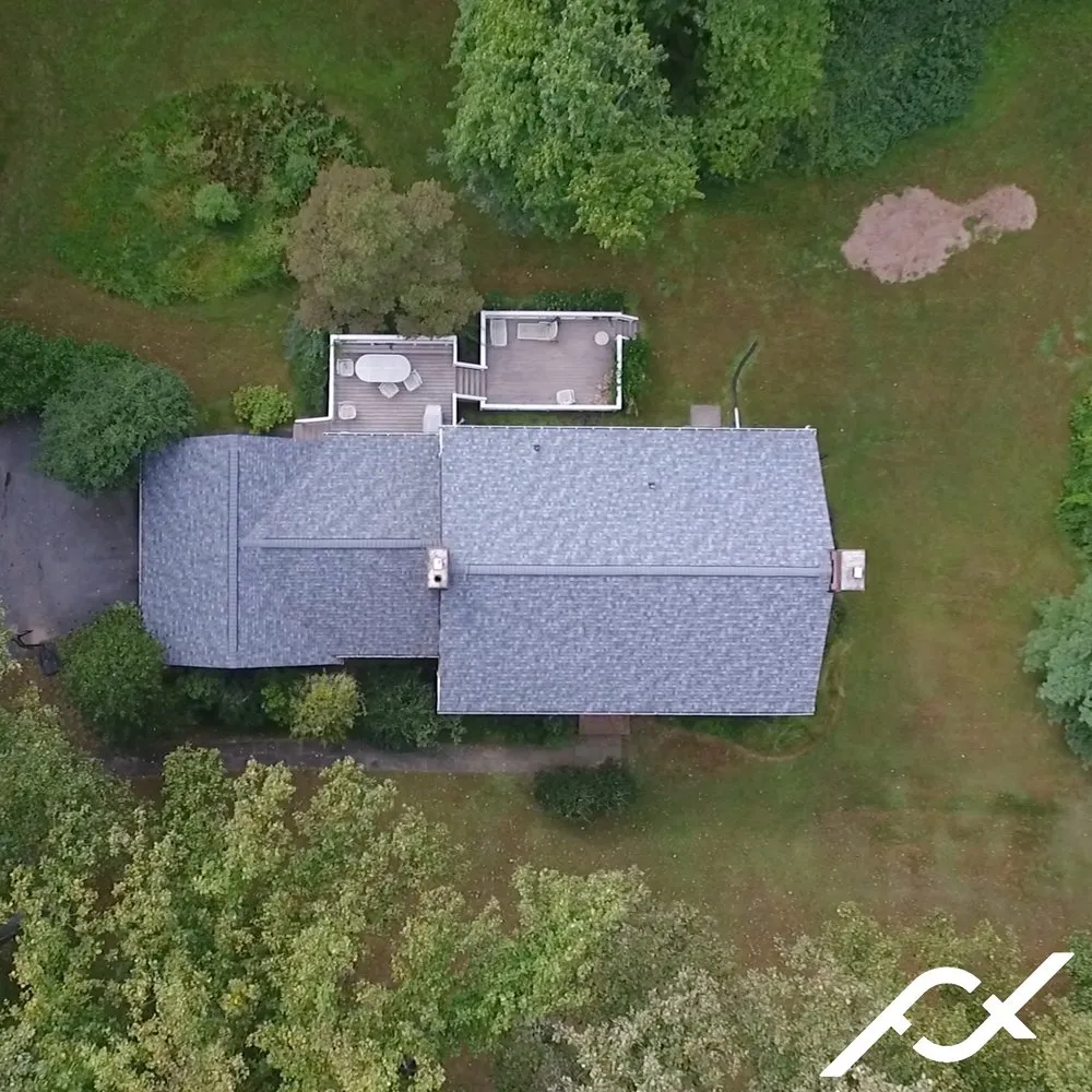 Slide of Four Twelve Roofing