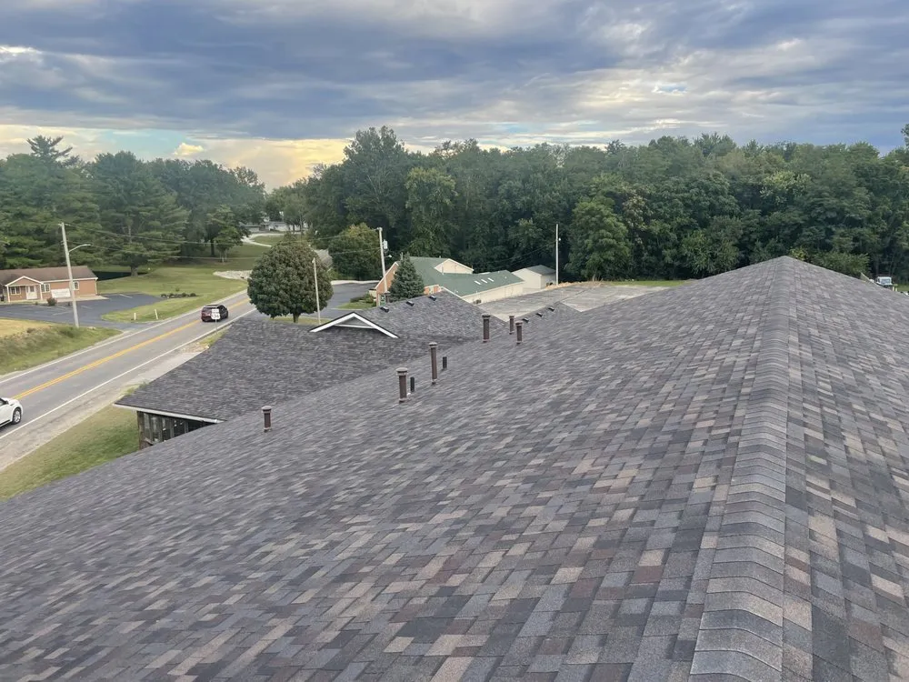 Slide of Fourth Street Roofing