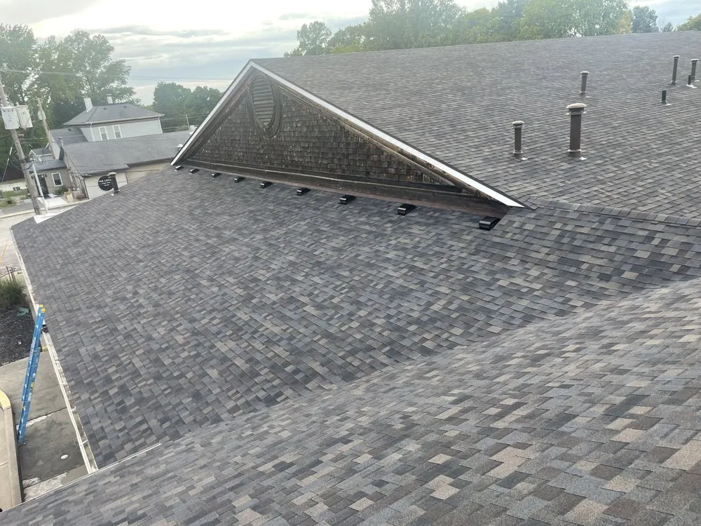 Slide of Fourth Street Roofing