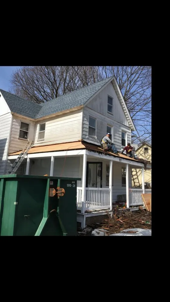 Slide of FP Contruction Roofing Company