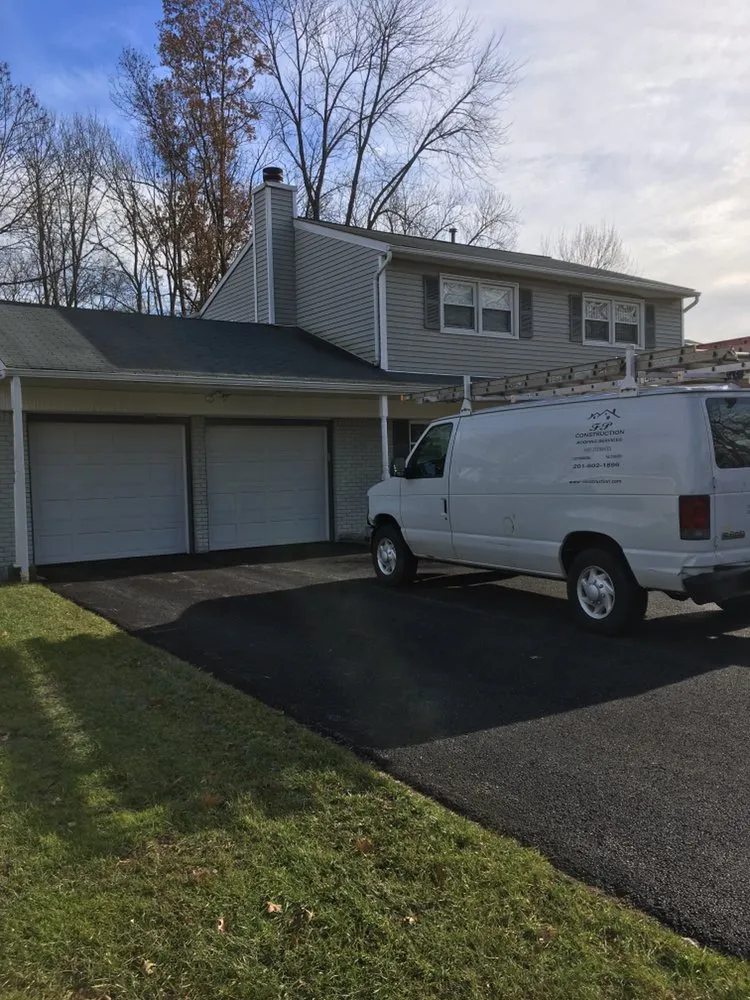 Slide of FP Contruction Roofing Company