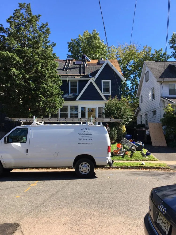 Slide of FP Contruction Roofing Company