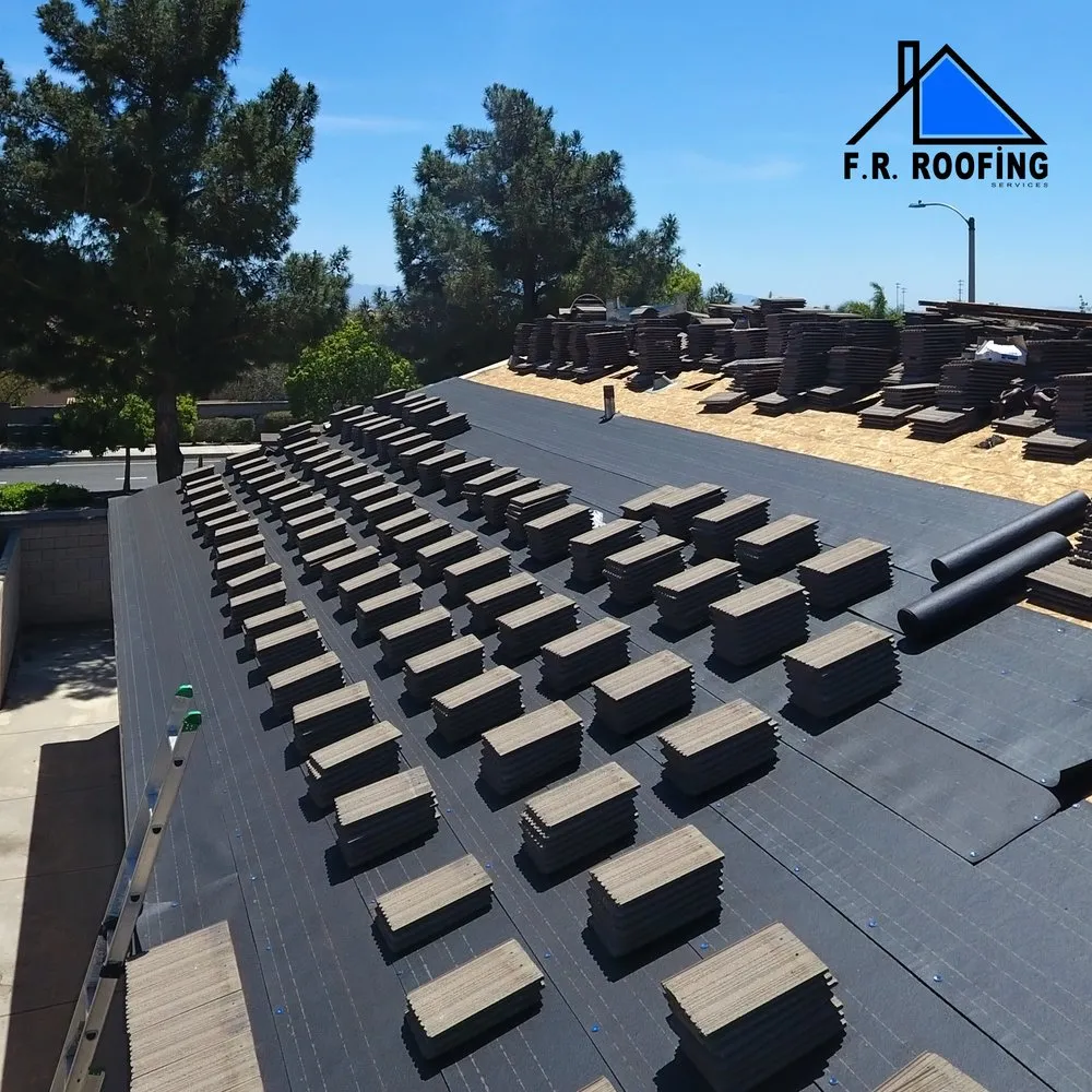 Slide of FR Roofing Services