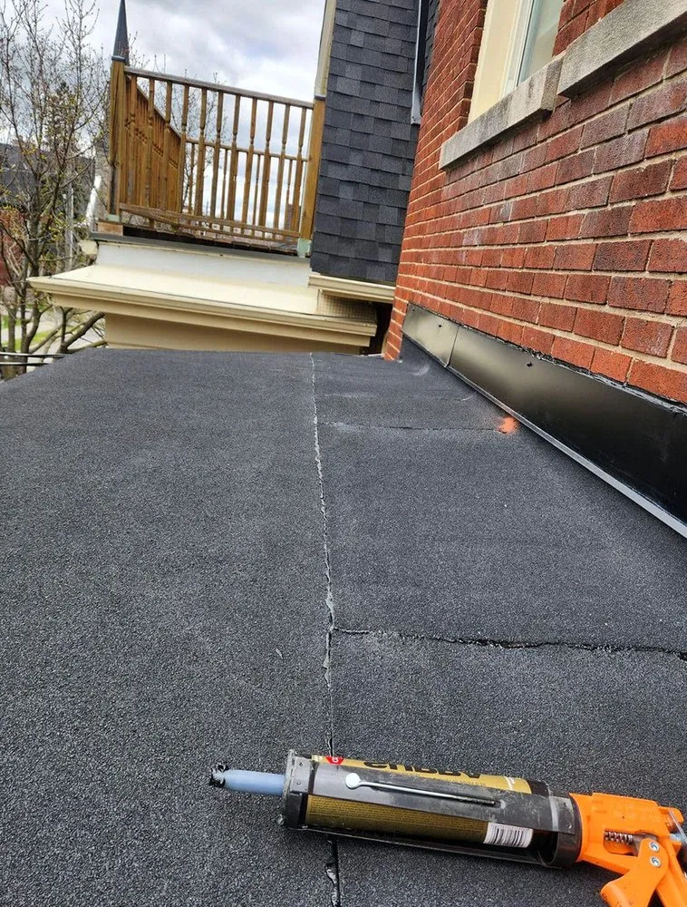 Slide of Framingham Roofing