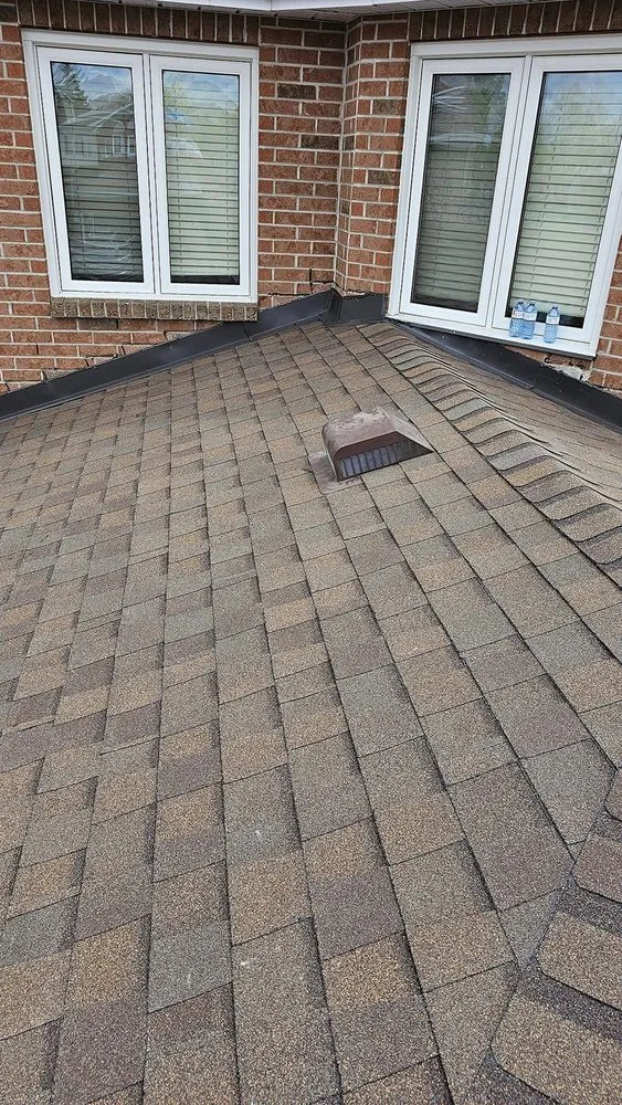 Slide of Framingham Roofing