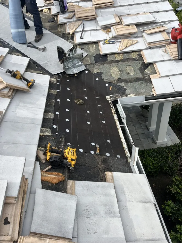 Slide of Francis Roofing Solutions