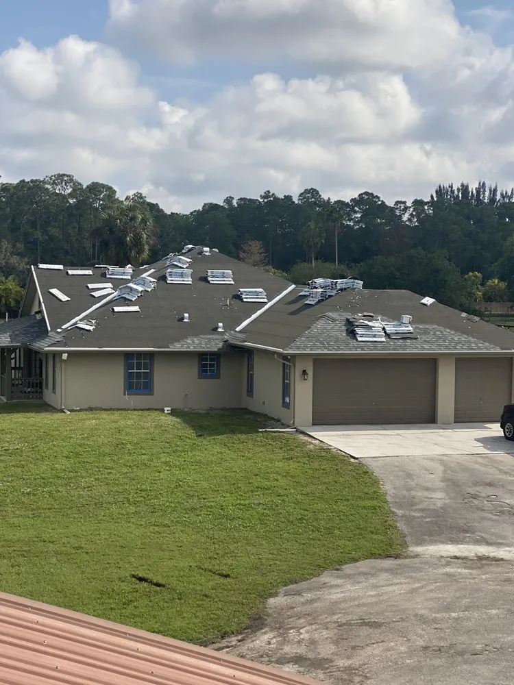 Slide of Francis Roofing Solutions