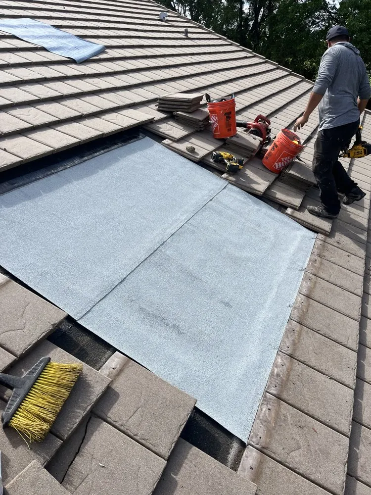 Slide of Francis Roofing Solutions