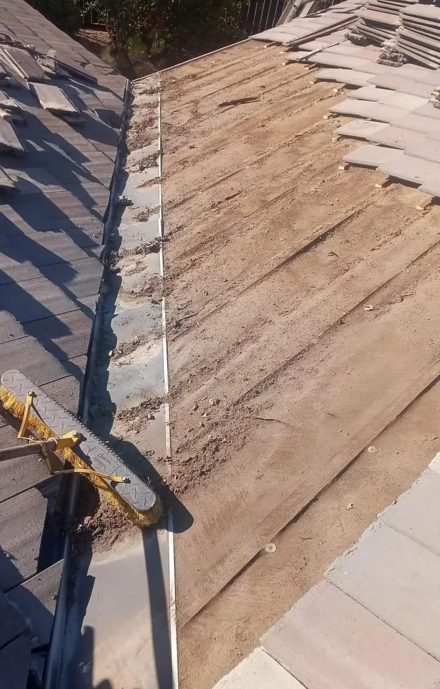 Slide of Francisco's Roof Maintenance