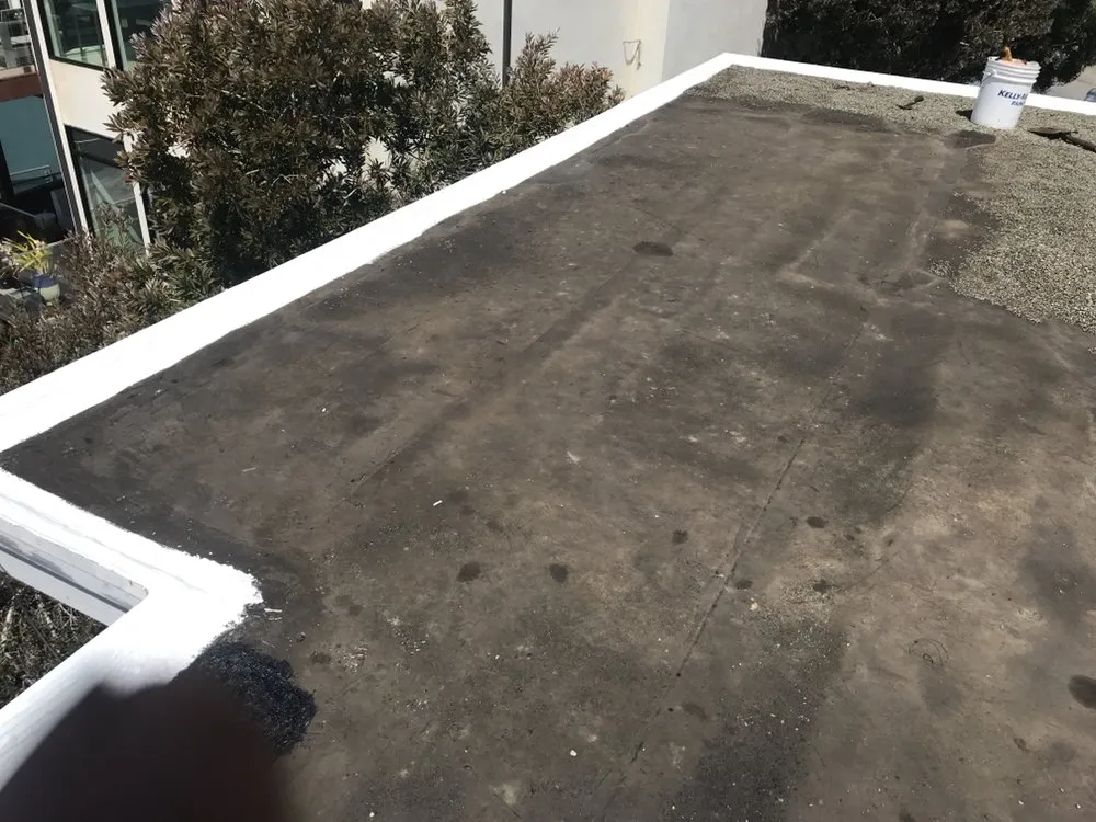 Slide of Francos Roofing