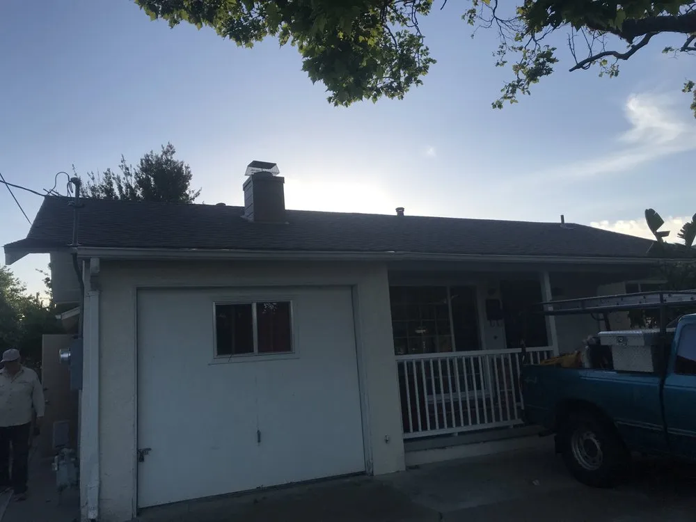 Slide of Francos Roofing