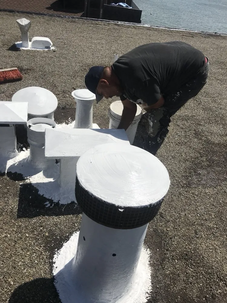 Slide of Francos Roofing